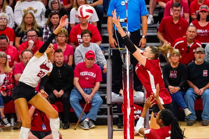 Oct 21, 2023; Lincoln, NE, USA; Wisconsin Badgers middle blocker Anna Smrek (14) attempts to block Nebraska Cornhuskers outside hitter Harper Murray (27) during the fourth set at the Bob Devaney Sports Center. Mandatory Credit: Dylan Widger-USA TODAY Sports